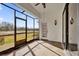 Screened porch overlooking a grassy backyard at 140 Stratford Ct, Haines City, FL 33844