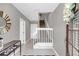 Inviting entryway with tile flooring and staircase at 1407 Chatfield Pl, Orlando, FL 32814