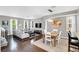 Spacious living and dining area with hardwood floors at 1407 Chatfield Pl, Orlando, FL 32814