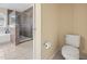 Bathroom with shower, tub, and toilet at 14236 Golden Rain Tree Blvd, Orlando, FL 32828
