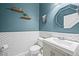 Stylish powder room with a contemporary sink and patterned tile at 14236 Golden Rain Tree Blvd, Orlando, FL 32828