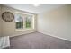 Well-lit bedroom with carpet and bay window at 14236 Golden Rain Tree Blvd, Orlando, FL 32828
