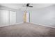 Spacious bedroom with carpet and sliding door closet at 14236 Golden Rain Tree Blvd, Orlando, FL 32828