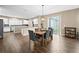 Kitchen with island, stainless steel appliances, and eat-in dining area at 14236 Golden Rain Tree Blvd, Orlando, FL 32828