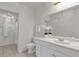 Bright bathroom, featuring a white vanity and shower at 1429 Yates St, Orlando, FL 32804