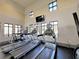 Well-equipped gym with treadmills, weight machines, and other exercise equipment at 14519 Crested Plume Dr, Winter Garden, FL 34787