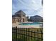 Community pool with a clubhouse at 14545 Cedar Branch Way, Orlando, FL 32824