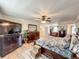 Large bedroom with king bed, TV, and plenty of furniture at 14639 Crosston Bay Ct, Orlando, FL 32824