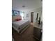 Bedroom with a king-size bed and large walk-in closet at 1662 Lima Ave, Kissimmee, FL 34747