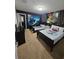 Harry Potter themed bedroom with two twin beds and Hogwarts house crest at 1662 Lima Ave, Kissimmee, FL 34747