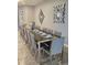 Elegant dining room with a large table and gray chairs at 1662 Lima Ave, Kissimmee, FL 34747