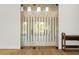 Modern wine cellar with glass doors and individual bottle storage at 16902 Vinci Way, Montverde, FL 34756