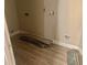 Unfinished laundry room with new flooring at 1760 Stafford Springs Blvd, Mount Dora, FL 32757