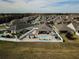 Aerial view of house with pool and large backyard at 1809 Hawksbill Ln, St Cloud, FL 34771