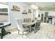 Bright dining room features a large wooden table with seating for six at 1809 Hawksbill Ln, St Cloud, FL 34771
