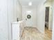 Inviting entryway with a white console table and stylish decor at 1809 Hawksbill Ln, St Cloud, FL 34771