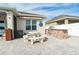 Outdoor kitchen area with brick grill and seating at 1809 Hawksbill Ln, St Cloud, FL 34771