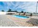 Relaxing pool area with pergola and outdoor kitchen at 1809 Hawksbill Ln, St Cloud, FL 34771