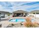 Relaxing pool area with patio furniture and lush landscaping at 1809 Hawksbill Ln, St Cloud, FL 34771