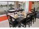 Bright dining room with lake view and seating for six at 1947 Quintilis Ct, Deltona, FL 32738