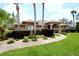 Brick home with manicured lawn and walkway at 1947 Quintilis Ct, Deltona, FL 32738