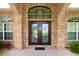 Elegant double front doors with decorative glass at 1947 Quintilis Ct, Deltona, FL 32738