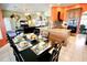 Open concept kitchen with breakfast bar and dining area at 1947 Quintilis Ct, Deltona, FL 32738