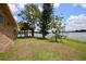 Peaceful backyard oasis with lake views and picnic table at 1947 Quintilis Ct, Deltona, FL 32738
