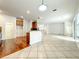 Kitchen features granite counters, oak cabinets, and hardwood floors at 2125 Tybee Rd, St Cloud, FL 34769