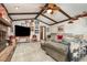 Spacious living room featuring high ceilings, a cozy fireplace, and comfortable seating at 2351 Mandarin Rd, Deland, FL 32720