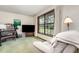 Inviting living room with a large window providing ample natural light and a cozy atmosphere at 2351 Mandarin Rd, Deland, FL 32720
