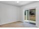 Bedroom with sliding door leading to a patio at 2860 Ne 42Nd Rd, Ocala, FL 34470