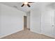 Spacious bedroom featuring neutral walls and a ceiling fan at 2860 Ne 42Nd Rd, Ocala, FL 34470