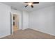 Bright bedroom with ceiling fan and access to bathroom at 2860 Ne 42Nd Rd, Ocala, FL 34470