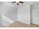 Bright bedroom with ceiling fan and neutral decor at 2860 Ne 42Nd Rd, Ocala, FL 34470