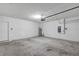 Spacious garage with interior access door at 2860 Ne 42Nd Rd, Ocala, FL 34470