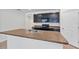 Modern kitchen with island, dark cabinets, and granite counters at 2860 Ne 42Nd Rd, Ocala, FL 34470