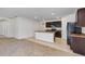 Open concept kitchen with an island and dark wood cabinets at 2860 Ne 42Nd Rd, Ocala, FL 34470