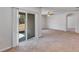 Living Room with sliding door leading to patio and access to other rooms at 2860 Ne 42Nd Rd, Ocala, FL 34470
