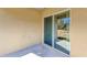 Covered patio with sliding glass door leading to backyard at 2860 Ne 42Nd Rd, Ocala, FL 34470