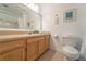 Clean bathroom with a toilet, sink, and shower/tub combo at 3016 Bonfire Beach Dr # 104, Kissimmee, FL 34746