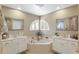 Spacious bathroom with double vanity and corner soaking tub at 3138 Jamber Dr, Ocoee, FL 34761