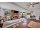 Living room featuring a brick fireplace and hardwood floors at 3501 Calumet Dr, Orlando, FL 32810