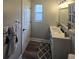 Bathroom with vanity, toilet, and wood-look floors at 4002 August Ct, Casselberry, FL 32707