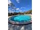 Kidney-shaped community pool with surrounding lounge chairs at 4002 August Ct, Casselberry, FL 32707