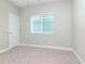 Bright bedroom with neutral walls and carpet flooring at 530 Windy Pine Way, Oviedo, FL 32765