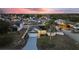 Aerial view of house and neighborhood at dusk at 5504 Hamlin Close Rd, Davenport, FL 33896