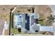 Top-down view showcasing home, solar panels, and screened pool at 5504 Hamlin Close Rd, Davenport, FL 33896