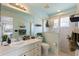 Clean bathroom with shower, toilet and vanity at 5504 Hamlin Close Rd, Davenport, FL 33896