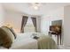 Bedroom with double bed, TV, and ample closet space at 5504 Hamlin Close Rd, Davenport, FL 33896